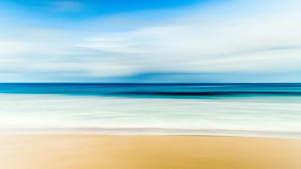 Motiv zidne tapete Pješčana plaža uz ocean
