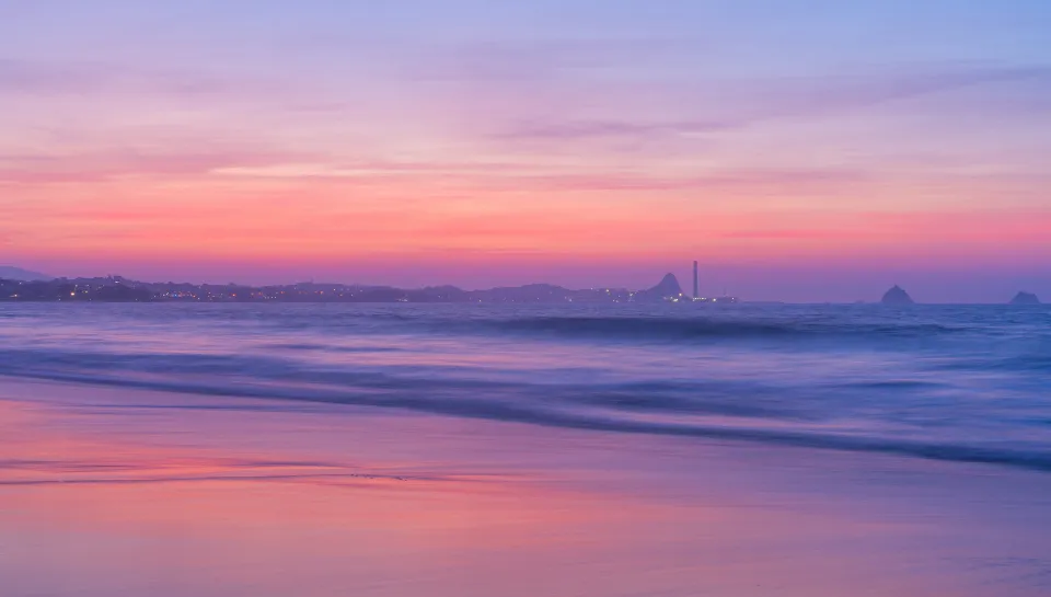 Motiv zidne tapete Pastelna plaža s oblacima